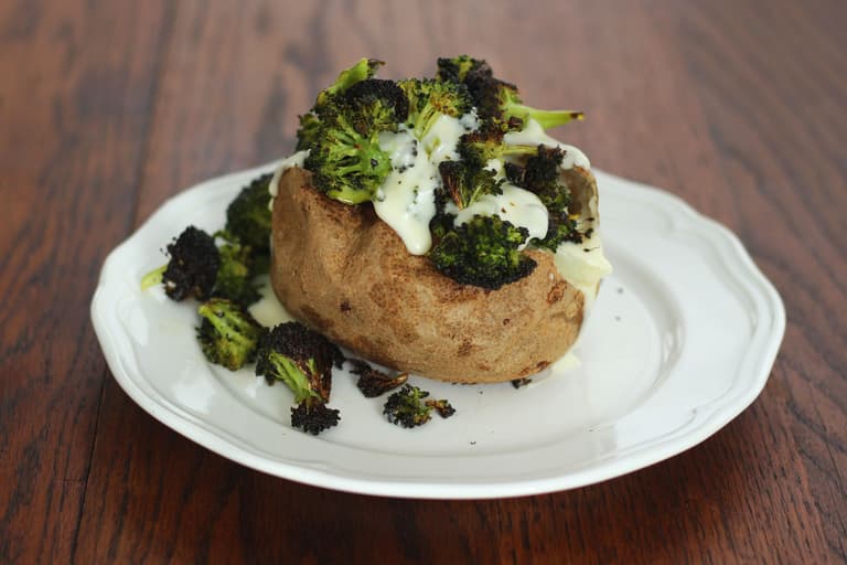 Image of Baked Potato with Roasted Broccoli and Cheddar Cheese Sauce.