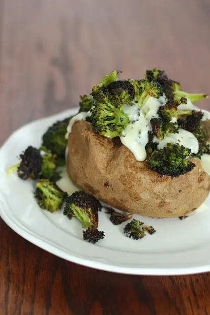 Image of Baked Potato with Roasted Broccoli and Cheddar Cheese Sauce.