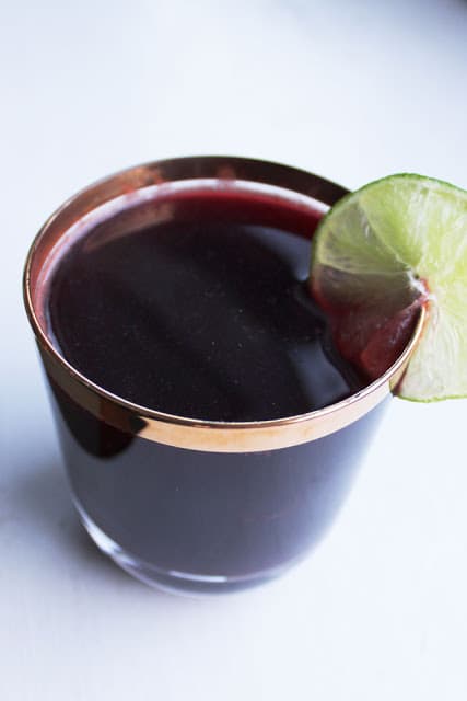 Image of Mulled Red Wine with Cinnamon and Lime Zest.