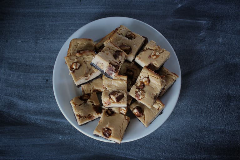 Picture of Peanut Butter Snickers Cheesecake Bars